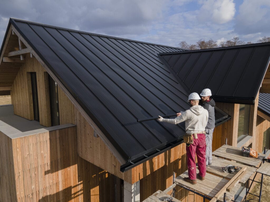 Ohio roofing company completing metal reroof installation on a residential home