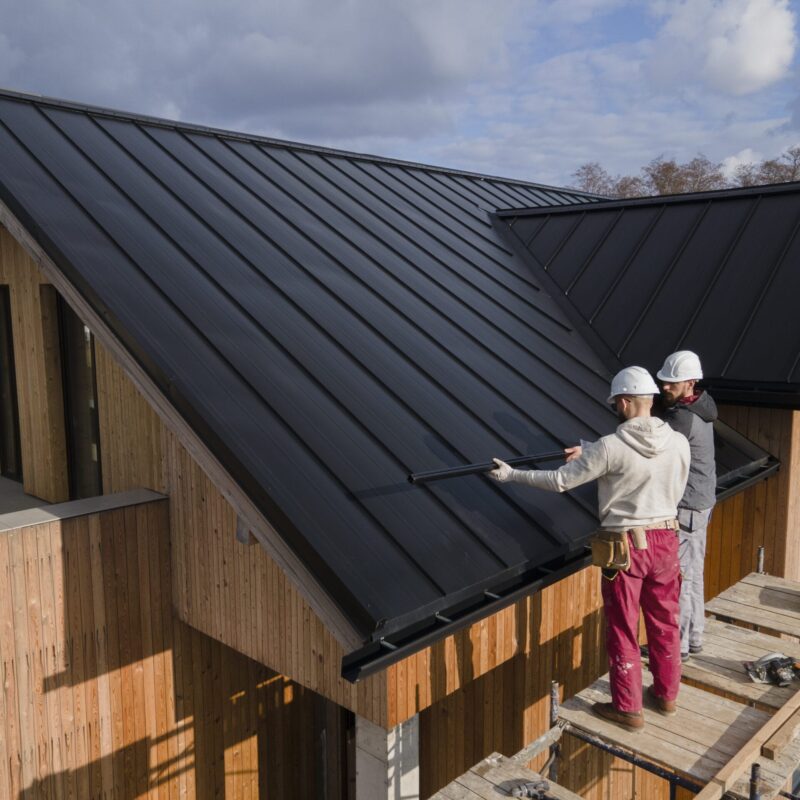 Ohio roofing company completing metal reroof installation on a residential home